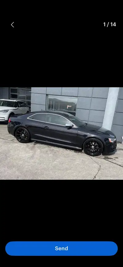 This 2013 Audi RS5 is a powerful450hp and elegant luxury coupe featuring a high-performance engine,...