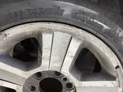 I'm selling a set of four F150 tires mounted on rims, size 265/70R17LT, complete with tire pressure...