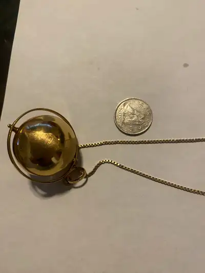 10k solid gold chain and world pendent , 12.06 grams, View more