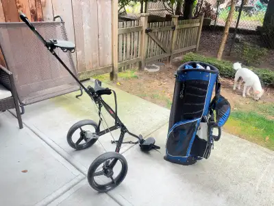 Golf cart with bag and club, View more