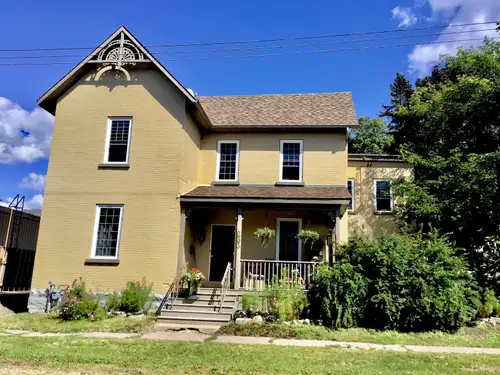 This classic century home comes with the added bonus of an adjoining Coach House/ Granny In-Law Suit...