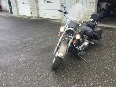 2004 soft tail. Very nice bike. Windshield, brakes and battery are within 3 yr purchase. Maybe 1000...