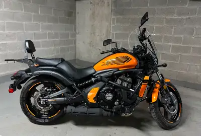 Beautiful Vulcan, orange and black (turns heads!). Two windshields with full hardware, back seat wit...