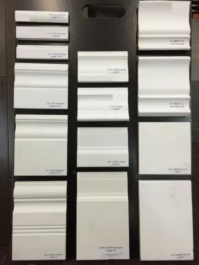 SALE ON ALL MOULDINGS AND TRIM ALL WOOD ALL PRIMED WHITE CALL MIKE 416-990-9390 BASBOARD STEP BEVEL...
