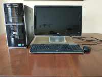 HP computer with hard drive, screen, keyboard, mouse