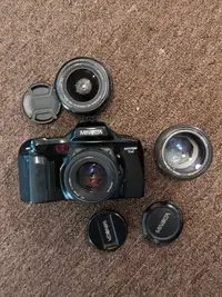 Minolta film camera with three lens and flash
