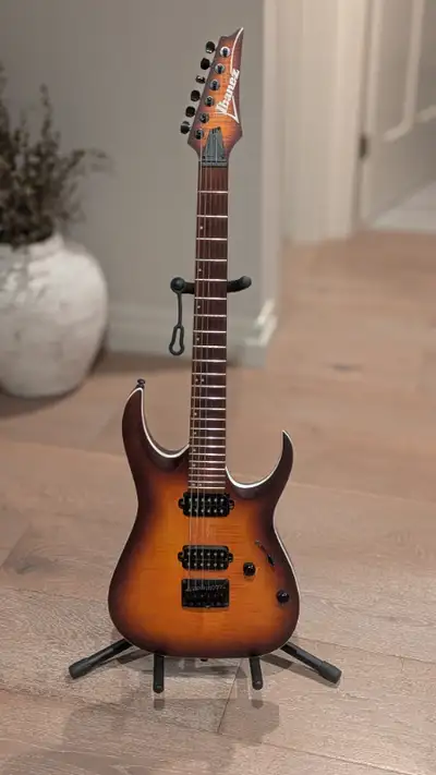 I bought it new in 2022 for around $600. It has seen the usual cosmetic wear and tear of a used guit...
