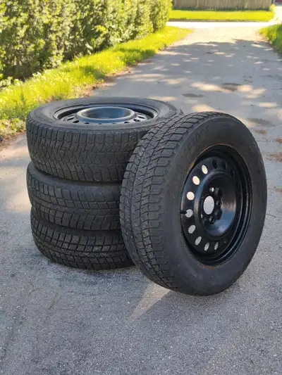 4 225/65R17 Winter Tires. 2 are Goodyear (Excellent Thread) and other 2 are Bridgestone (Great Threa...