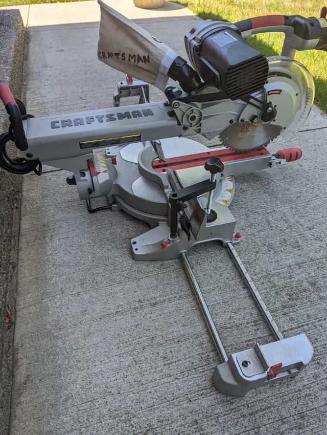 10 in. CRAFTSMAN SLIDING MITRE SAW with NEW STAND in Power Tools in London - Image 6