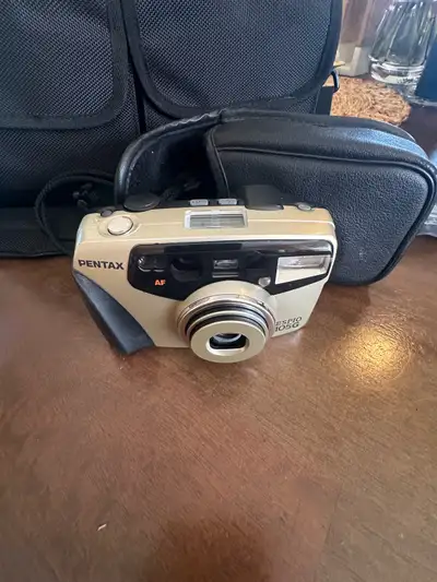 Pentax ESP10 105G Camera with Olympus Case and charger, excellent working condition $50 obo