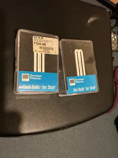 Seymour Duncan hot rails bridge pickup and cool rails neck pickup. New sealed in package. Don’t need...