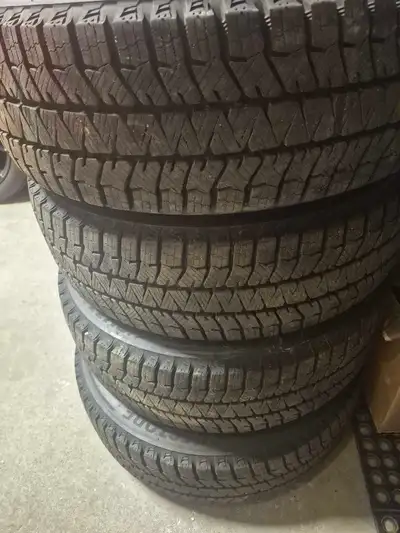 Only 3 months old, used on our VW Tiguan, Bridgestone Blizzak WS90 Winter tires, like new!! Size: 21...