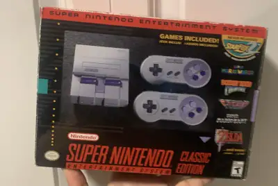 Relive the golden age of gaming with this classic Nintendo Super Nintendo Classic Edition! In great...