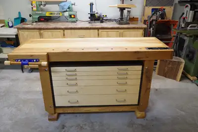 Woodworking Bench. Top is 22” deep x 65” long x 1-7/8" thick, 34 ½” high. Bench is built using white...