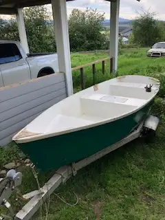 A custom-built twelve-foot boat and registered trailer. Both are in good shape and the boat is a dre...