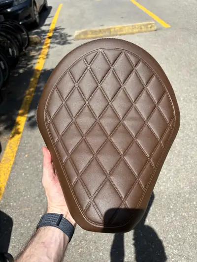 Brand new Buffalo Brown OEM Honda seat. Came with the bike from the dealership but I’m going a diffe...