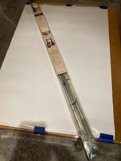 Levolor curtain rod. 38"-66" universal track, low-profile traverse rod. Silver color. Unopened. More...
