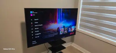 65 in Samsung tv with tv stand Model number qn65q8fnbfxzc, it's in a very good condition.