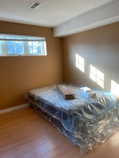 This is a comfortable room in a house in southern Windsor. Queen bed, small side table and cloth clo...