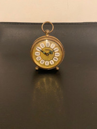 Antique Monroe wind up filigree brass alarm clock.