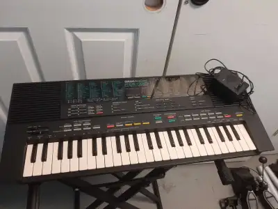 Yamaha PSS-480 Keyboard with power supply , View more