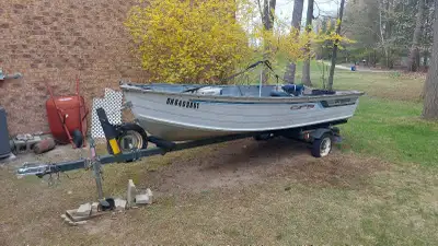 14 ft aluminum Grumman with a tohatsu 20hp 4 stroke fuel injected extremely quiet 50 hrs on the moto...