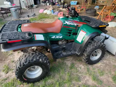 Runs great, 2stroke, oil injection, newer winch and plow