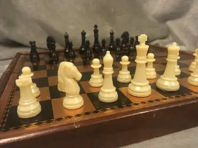 This backgammon chess and checkers game is in wonderful condition, the wood box is damage free and t...