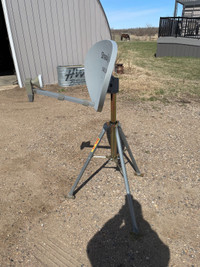 Shaw satellite dish with tripod stand