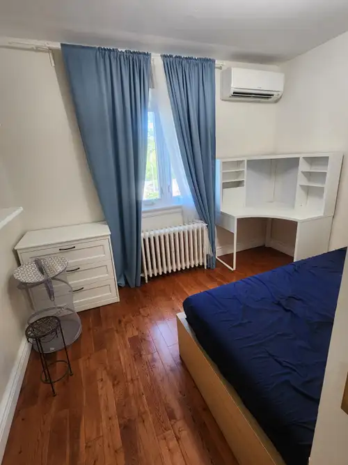 Quiet private room in female-only house near High Park. Steps to Dundas West and Keele subway statio...