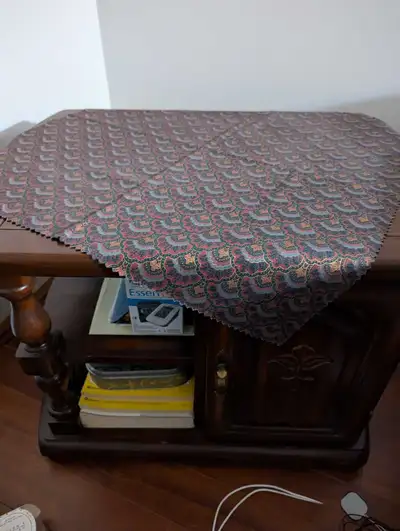 Like new end table. Name of the rosewood Good shape. Call me hundred bucks 7806862228 it is solid wo...