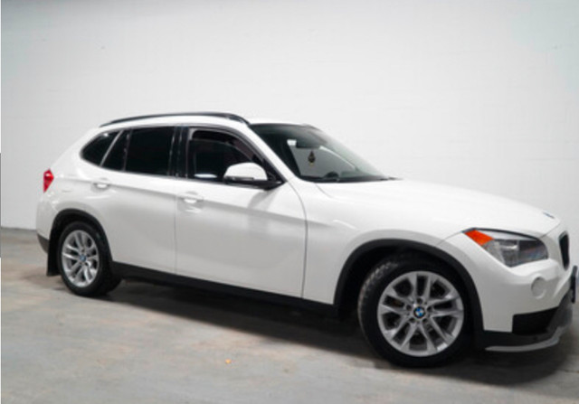 BMW X1 2015 white on black leatherette dans Autos et camions  à Laval/Rive Nord