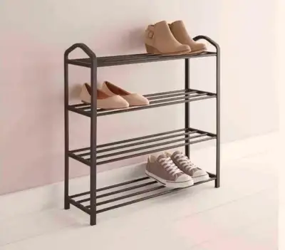 Keep your shoe collection organized with this four-tier shoe rack, perfect for entryways, closets, o...