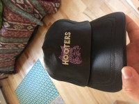Hooters leather hat.  Never worn!!!