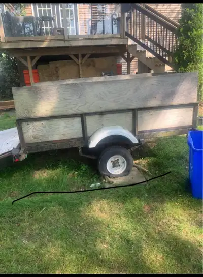 53”x80” Drop ramp Frame , axel and side appear solid Marine grade plywood sides and bottom Needs wor...