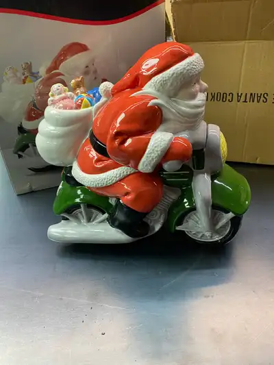 Santa riding on Harley ceramic cookie jar $40.00 OBO, View more