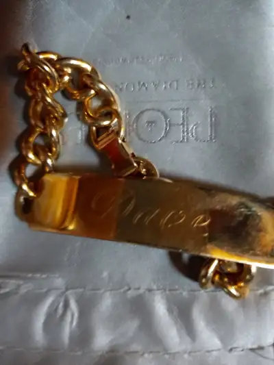 GOLD COLOR CHILDS BRACELET  SAYS  DAVE, View more