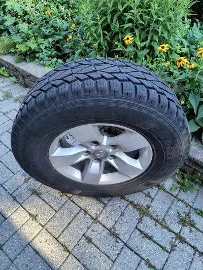 4 Tires & Rims for Ram 1500 (5 Bolt) The tires have less than 6,000 km. on them. (Sold my truck) The...