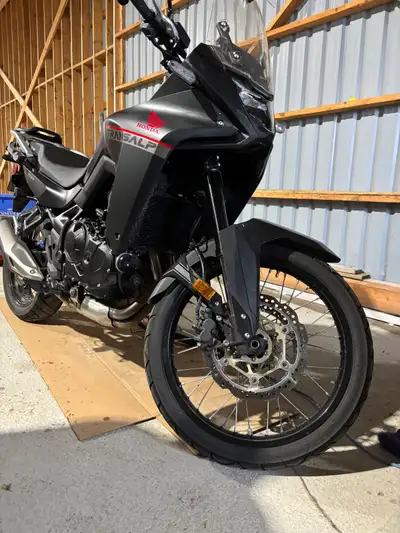 2024 Honda Transalp XL750. Black. One owner, mature rider. Never dropped or scratched. stored inside...