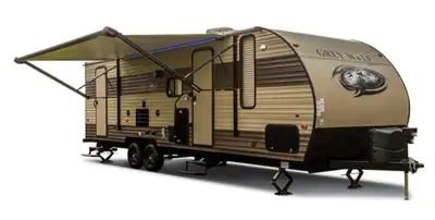 The Grey Wolf 26DBH by Forest River is a spacious and versatile travel trailer, perfect for families...