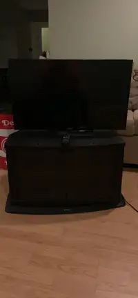 Sony 32 inch Tv with a Sony stand 
