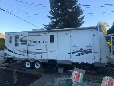2007 StarCraft Homestead LITE SERIES 282RSQB – 29’ Toy Hauler Get ready for your next camping advent...