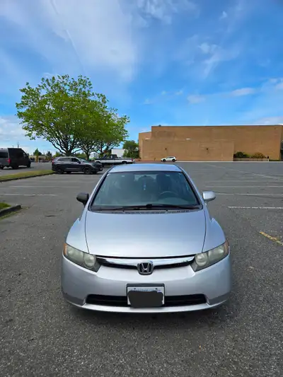 The 2008 Honda Civic in grey is a dependable and fuel-efficient sedan that’s perfect for daily commu...