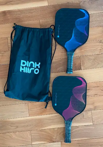 2 Dinkhiro Pickleball racquets & Bag, never used. Great for beginners with convenient carrying case....