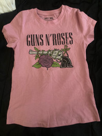 Pink guns n’ roses shirt and jeans 