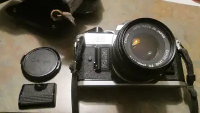 Canon AE-1 Program 35mm SLR Film Camera with Canon FD 50mm F1.8, View more