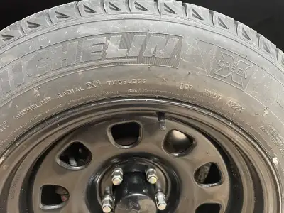 Like new Custom Steel Wheels . Heavy duty - with 225/65r17 Michelin X Ice snow tires. 9+/32 tread de...