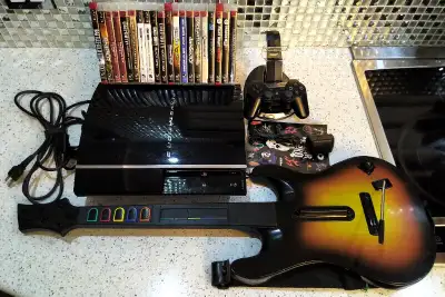 Playstation 3 Bundle 20 Games Guitar Dualshock3, View more