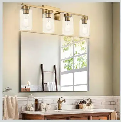 New in box 4-light gold Bathroom Vanity light. Price is firm. Pickup in Orléans close to navan and r...