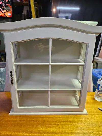 Hanging curio cabinet, View more